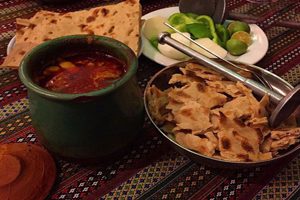 آبگوشت کرمانشاهی با گوجه سبز غذایی سنتی و بی نظیر